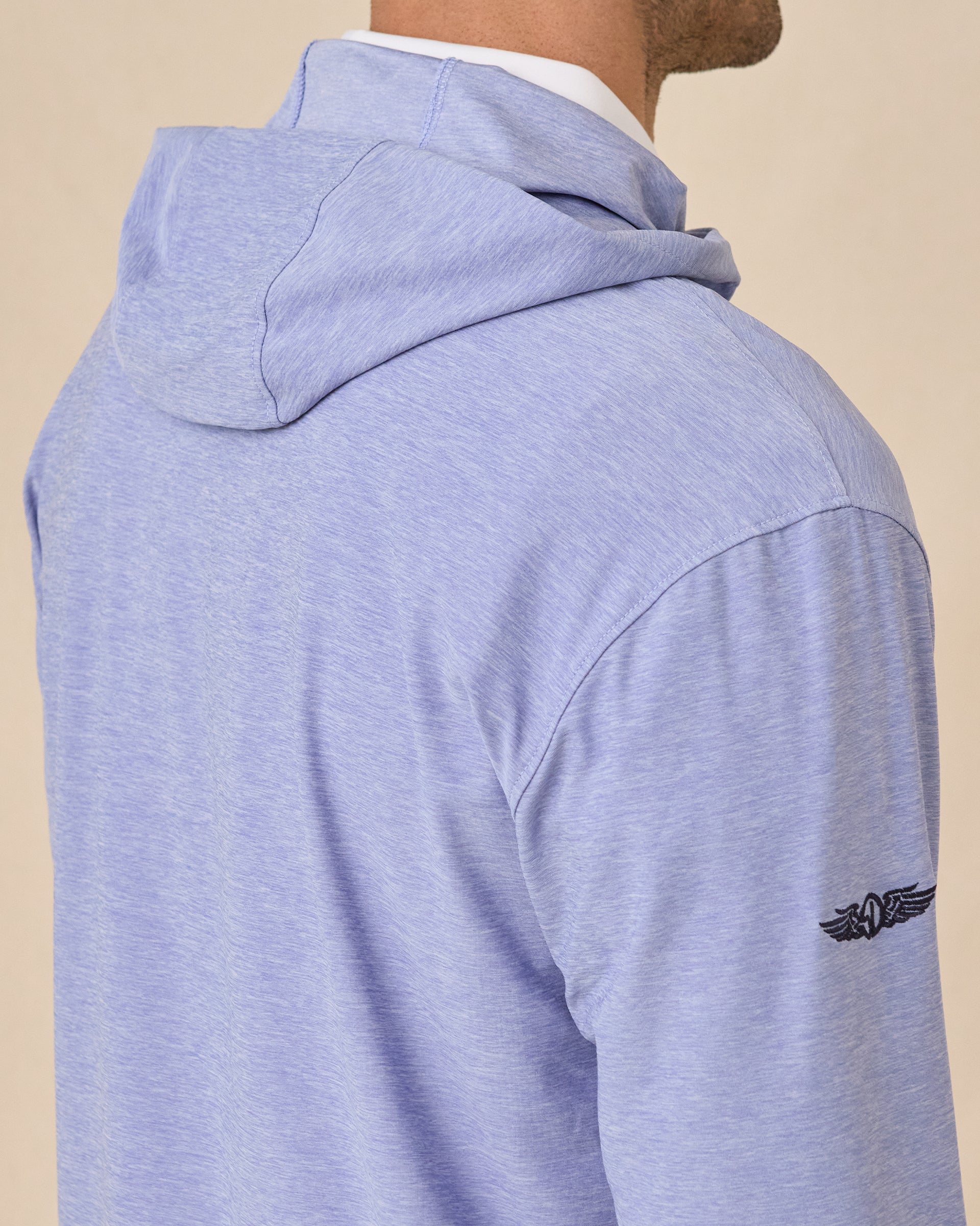 Close-up of the Hermosa Hoodie in Tidal Blue showcasing the embroidered Straight Down logo on the sleeve