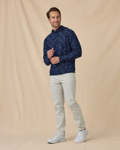 Men’s Commander Hoodie in New Indigo camouflage print, styled full outfit view with light pants
