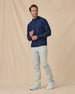 Men’s Commander Hoodie in New Indigo camouflage print, styled full outfit view with light pants