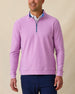 Men’s heather pink quarter-zip pullover with contrast blue inner collar, styled with navy pants.