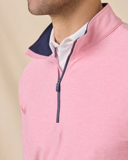 Close-up of the Oceanside 2.0 Quarter Zip in Punch Pink showcasing the contrast navy collar lining, quarter-zip placket, and soft heathered fabric