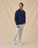 Men’s Bel Air Quarter Zip in New Indigo / Flag Red, styled full outfit view with light pants