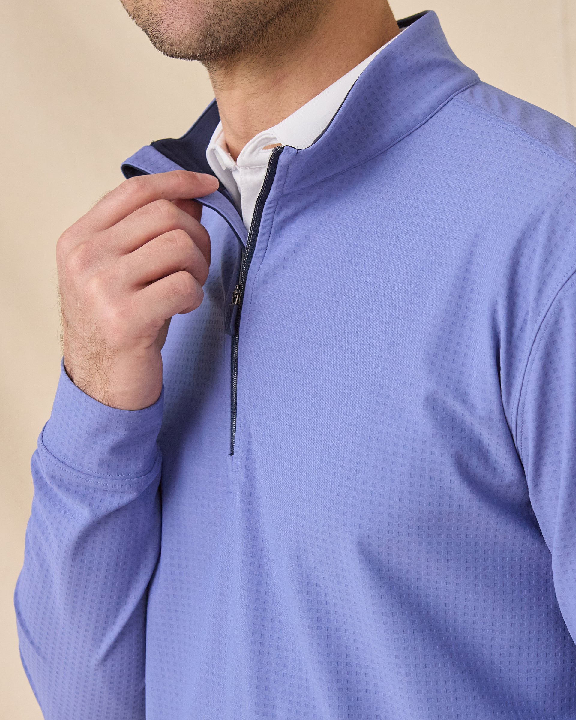 Close-up of the Bel Air Quarter Zip in Tidal Blue featuring contrast navy interior collar and zipper detail