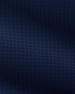 A close-up of a dark navy blue textured fabric with a subtle woven geometric pattern.