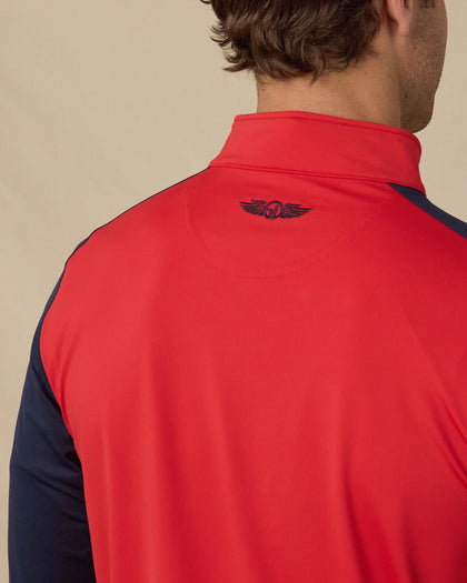 Falcon Quarter Zip in Flag Red with navy sleeves, back logo detail close-up