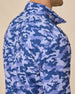 Close-up of the Arlington Quarter Zip in Tidal Blue highlighting the embroidered Straight Down logo below the collar