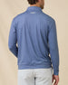 Back view of a man wearing the Mulholland Quarter Zip in Moonlight, showing the allover geometric print and embroidered logo below the back collar.