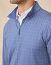 Close-up of the Mulholland Quarter Zip in Moonlight showing the geometric print, quarter-zip closure, zipper pull, and contrast blue inner collar.