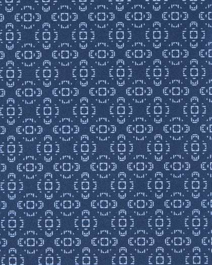 Close-up of the Mulholland Quarter Zip in Moonlight fabric featuring a repeating light blue geometric pattern.
