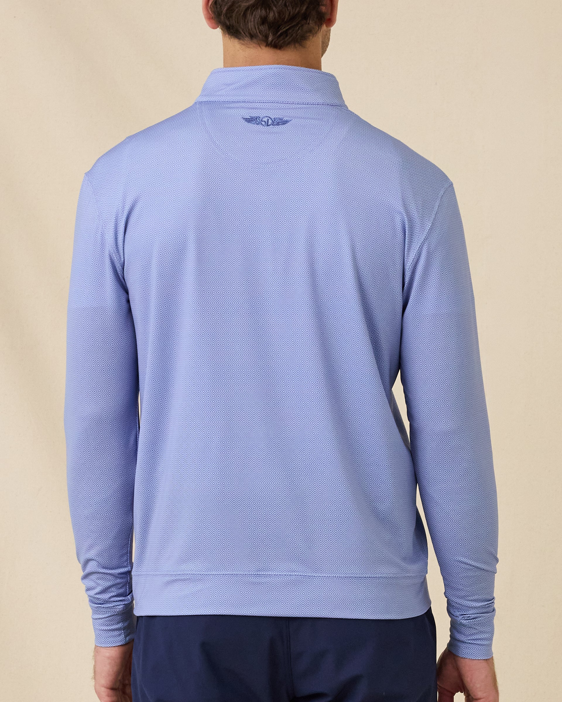 Back view of the San Marino Quarter Zip in Tidal Blue showcasing the geometric print