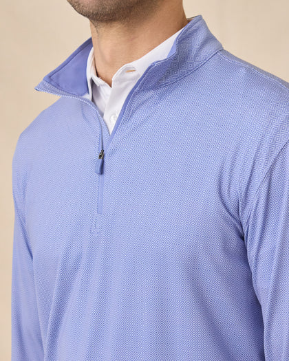 Close-up of the San Marino Quarter Zip in Tidal Blue featuring a subtle geometric print highlighting collar and zipper