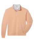 Glendale Quarter Zip in Cantaloupe featuring a soft peach-orange finish, stand collar, quarter-zip closure, and banded cuffs and hem.