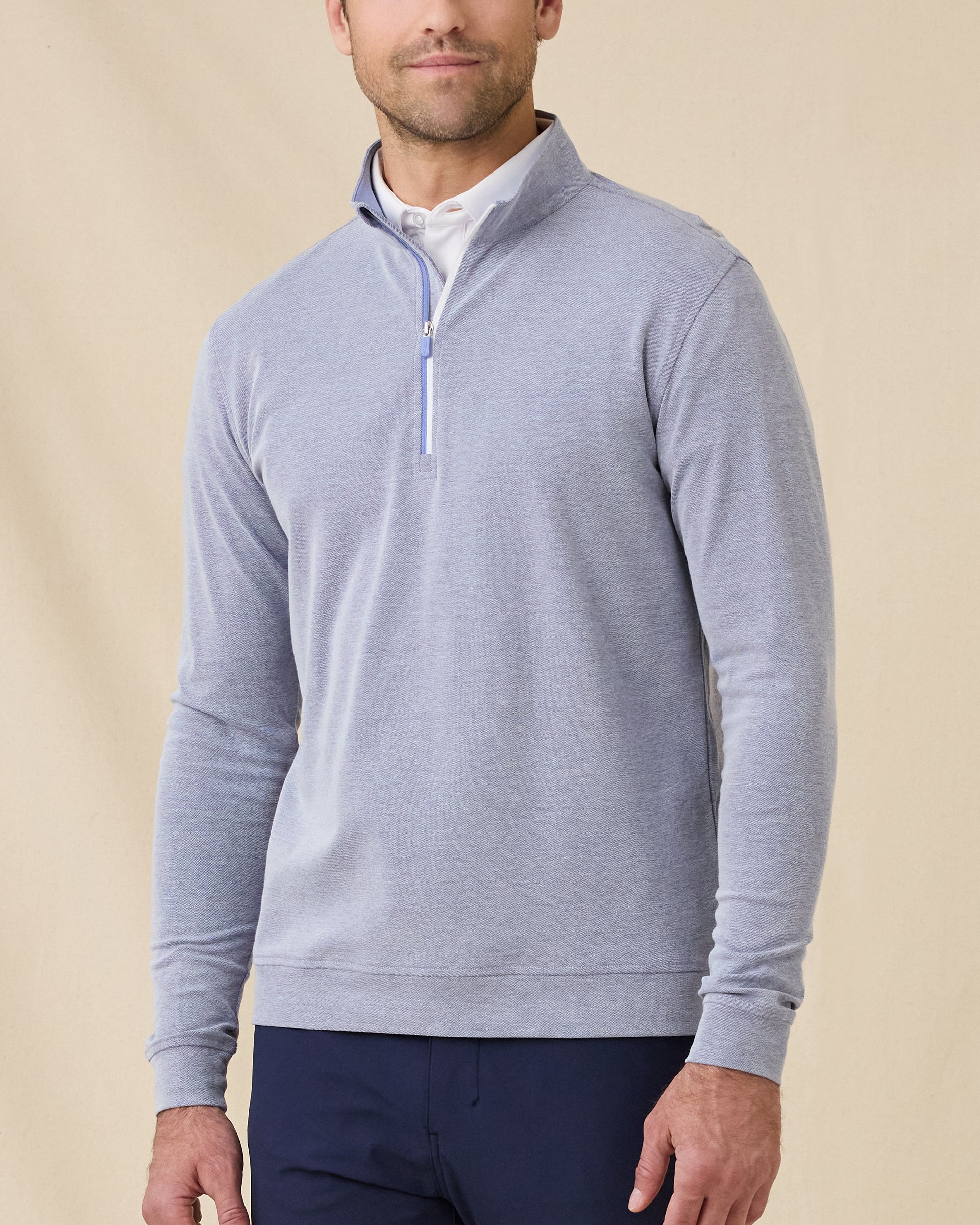 Model wearing the Glendale Quarter Zip in Tidal Blue