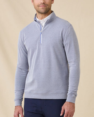 Model wearing the Glendale Quarter Zip in Tidal Blue