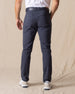 Men's Claremont Five Pocket Twill Pant in Ink, back on-model view featuring two patch pockets in dark navy twill fabric, styled with a white t-shirt, navy leather belt, and white shoes