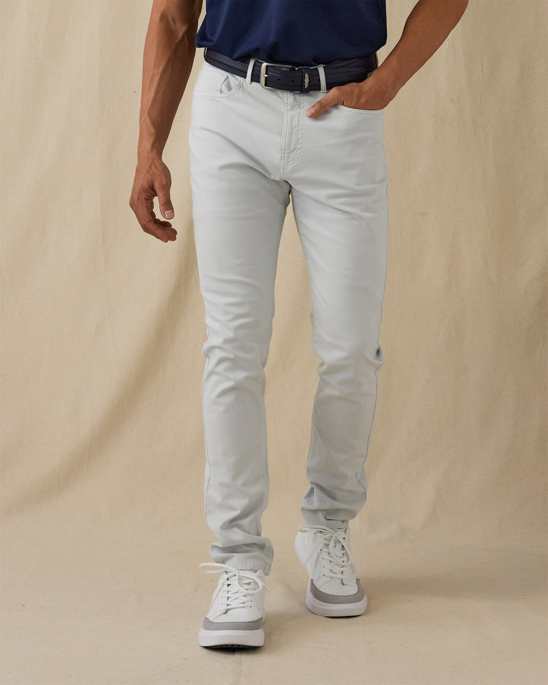 Men's Claremont Five Pocket Twill Pant in Silver, front on-model view featuring a light gray twill fabric, styled with a navy polo, navy leather belt, and white shoes