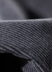 Men's Smithson Corduroy Pant in Walrus, macro detail view showcasing the rich texture and raised wale pattern of the charcoal gray corduroy fabric