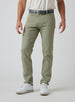Men's Henderson 5 Pocket Pant in Moss, front model view featuring a five-pocket silhouette styled with a navy belt and white golf shoes