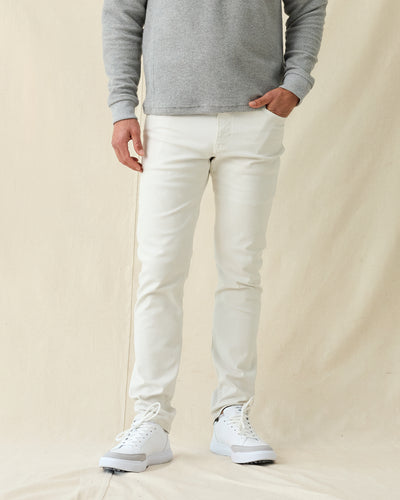 Men's Henderson 5 Pocket Pant in Vapor, front view on model featuring five-pocket styling, paired with a gray sweatshirt and white shoes