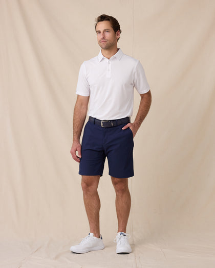 Flex Short in Navy, styled full outfit view with white polo