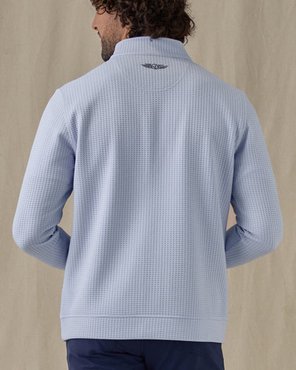 Men's Hollister Snap Placket Pullover in Powder, on model back view featuring a light blue waffle-knit pullover with Straight Down logo at the upper back and ribbed hem