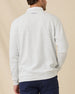 Model wearing the Hopkins Crew in Heather, showing the textured knit and embroidered logo below the back neckline.