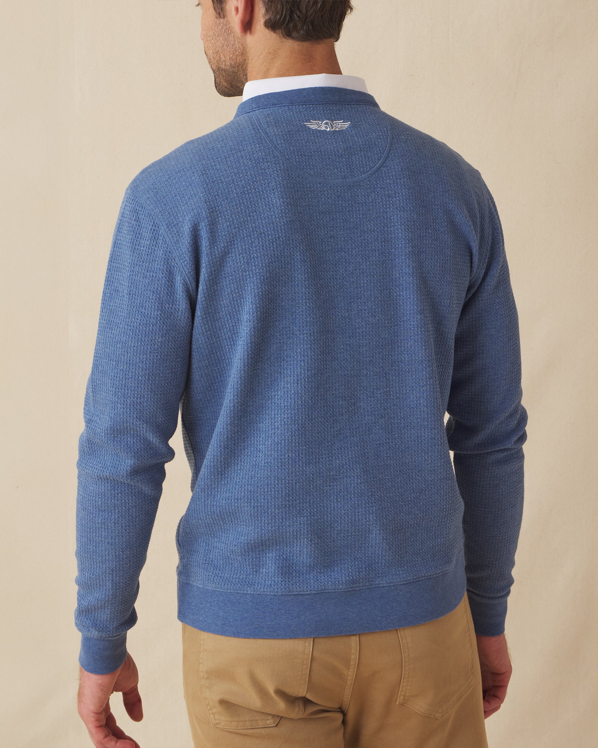 Men's Hopkins Crew in Moonlight, back view on model featuring a waffle-knit texture with Straight Down logo embroidered at center back neck, layered over a white polo, paired with khaki pants