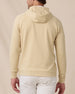 Back view of a model wearing the Gridlock Hoodie in Sandstorm, showing the hood and textured waffle knit.