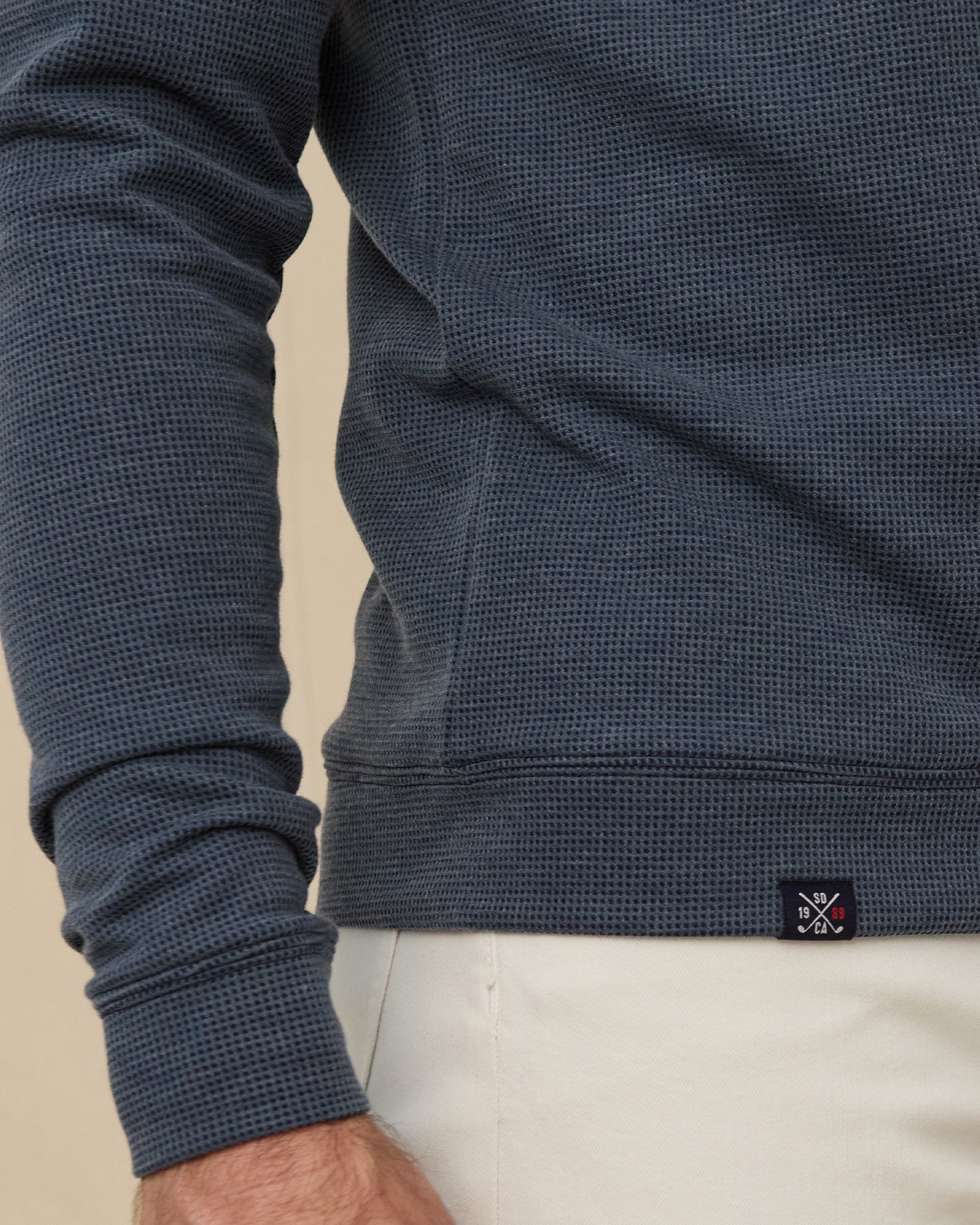 Gridlock Hoodie in New Indigo with hem label detail