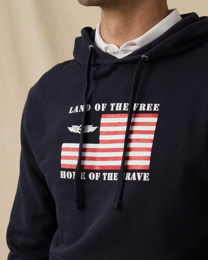 Freedom Hoodie in Navy with “Land of the Free, Home of the Brave” graphic detail