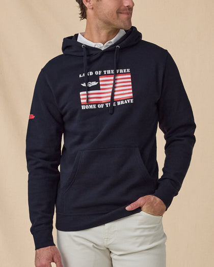 Freedom Hoodie in Navy, front model view with patriotic flag graphic