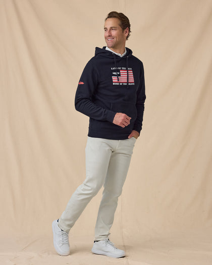 Freedom Hoodie in Navy, styled full outfit view with light pants