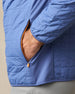 Close-up of the Big Sky Quilted Jacket in Moonlight, highlighting the zippered hand pocket, grid quilting, and stretch side panel.