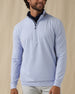 Men's Cimarron Quarter Zip in Lavender, front view on male model showcasing light blue-purple body with grey heathered collar and quarter zip, layered over a navy polo against a neutral backdrop