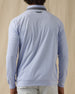Men's Cimarron Quarter Zip in Lavender, back view on male model showing embroidered logo at center back neck and grey heathered collar, paired with light grey pants