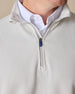 Men's Cambria Quarter Zip in Stone, close-up detail view of the quarter zip closure featuring a navy Straight Down branded zipper pull against the cream white ribbed knit fabric, layered over a white collared shirt