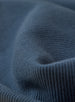 Men's Catalina Quarter Zip in Deep Sea, macro detail view showcasing the soft ribbed texture and tonal horizontal stripe pattern of the slate blue fabric