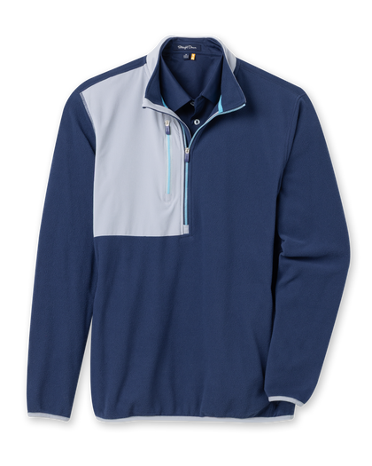 Men's Moonstone Quarter Zip in New Indigo, flat lay front view featuring a navy fleece body with a grey contrast chest panel, light blue zipper tape, long sleeves, and side hand pockets