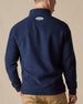 Men's Leucadia Quarter Snap Pullover in Indigo, back model view featuring a logo patch at the upper back yoke, styled with khaki pants