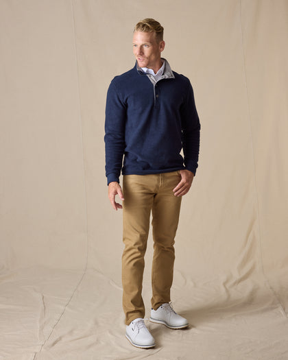 Men's Leucadia Quarter Snap Pullover in Indigo, full-length front model view styled with khaki pants and white golf shoes against a neutral canvas backdrop