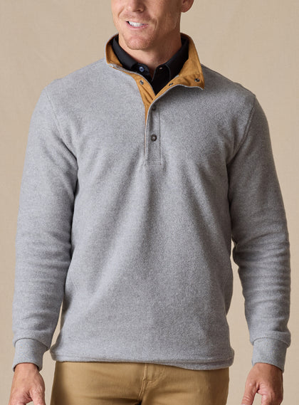  Men's Leucadia Quarter Snap Pullover in Light Charcoal, front view on model featuring a heather gray fleece long sleeve pullover with quarter snap placket and tan suede collar trim, layered over a black collared shirt