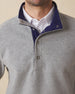 Men's Leucadia Quarter Snap Pullover in Heather, close-up front view on model highlighting the navy contrast inner collar and snap closure neckline detail