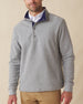 Men's Leucadia Quarter Snap Pullover in Heather, front view on model featuring a heather gray fleece with navy contrast inner collar and snap closure neckline, paired with tan pants