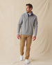 Men's Leucadia Quarter Snap Pullover in Heather, full length front view on model featuring a heather gray fleece with navy contrast inner collar, paired with tan pants and white shoes