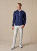 Men's Patron Quarter Zip in New Indigo Dark Blue paired with light gray pants, front view on model 