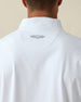 Men's Patron Quarter Zip in White Sage, close-up back view on model highlighting the Straight Down logo at upper back on a white base