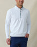Men's Patron Quarter Zip in White Sage, front view on model featuring a white base with a quarter zip closure and sage contrast zipper and collar lining detail, paired with navy pants