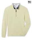 Men’s pale yellow quarter-zip pullover with ribbed texture, navy contrast collar, and zip closure featuring a leather pull tab. Made in the USA.