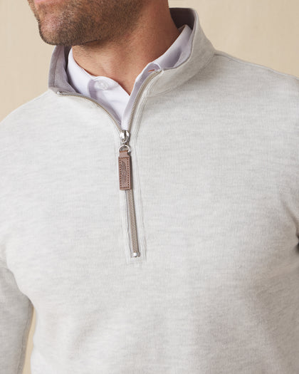 Men's Montecito Quarter Zip in Heather, close-up front view on model highlighting the silver quarter zip with leather Straight Down logo zip pull detail