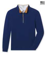 Men's Montecito Quarter Zip in New Indigo, flat lay front view featuring a solid navy long sleeve quarter zip with a gold collar interior, leather zipper pull, silver chain zipper, ribbed cuffs and hem